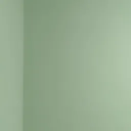 Świeżo pomalowany róg pokoju na delikatny, pistacjowy odcień zieleni, z widoczną białą listwą sufitową i delikatnym cieniem na ścianie.