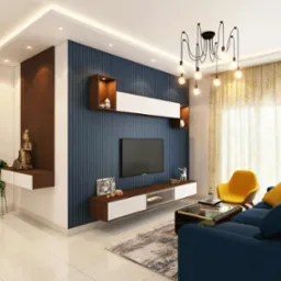 Nowoczesne wykończenie wnętrza salonu z niebieską tapetą w paski, podwieszanymi szafkami RTV, rzeźbą Buddy na półce i designerską lampą sufitową z żarówkami Edisona.