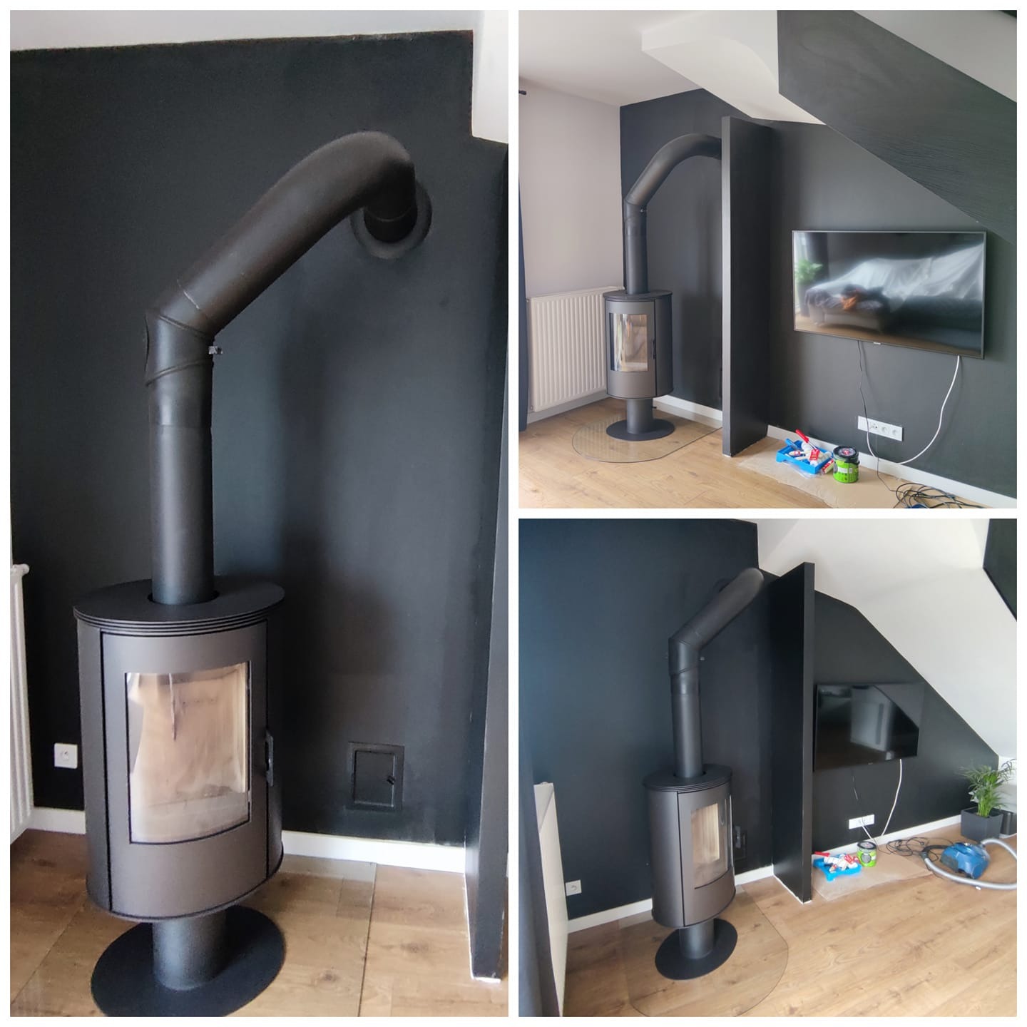 Nowoczesny piec wolnostojący z rurą dymową, pomalowany na czarno, na tle czarnej ściany w pokoju z drewnianą podłogą. Widoczne akcesoria malarskie i telewizor na ścianie.