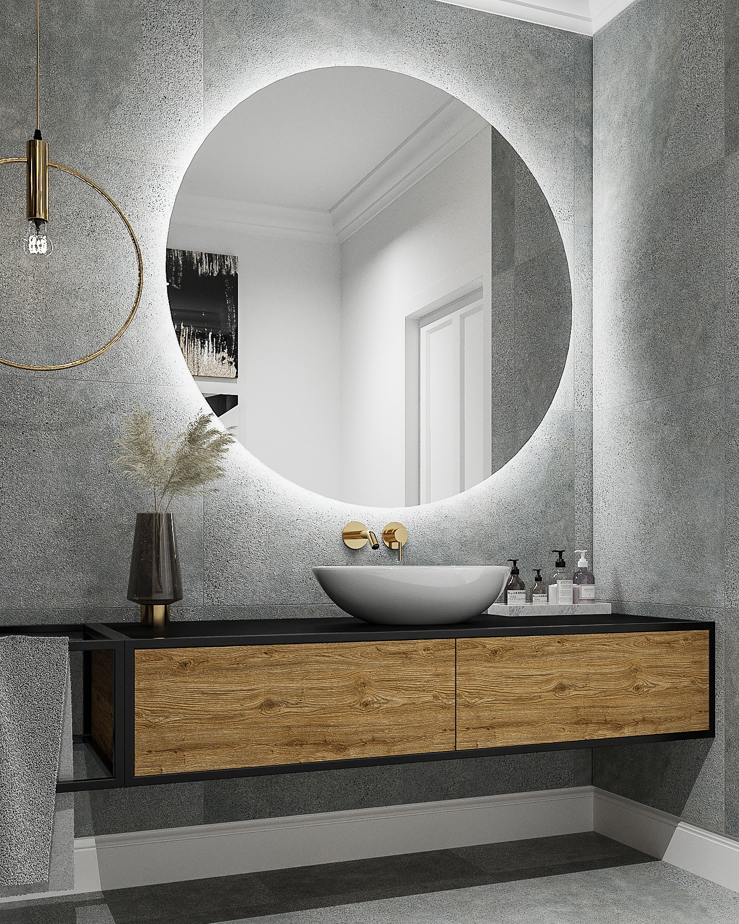 Nowoczesna łazienka z okrągłym lustrem podświetlanym LED, umywalką nablatową i szafką z drewnianymi frontami na tle szarych płytek imitujących beton.