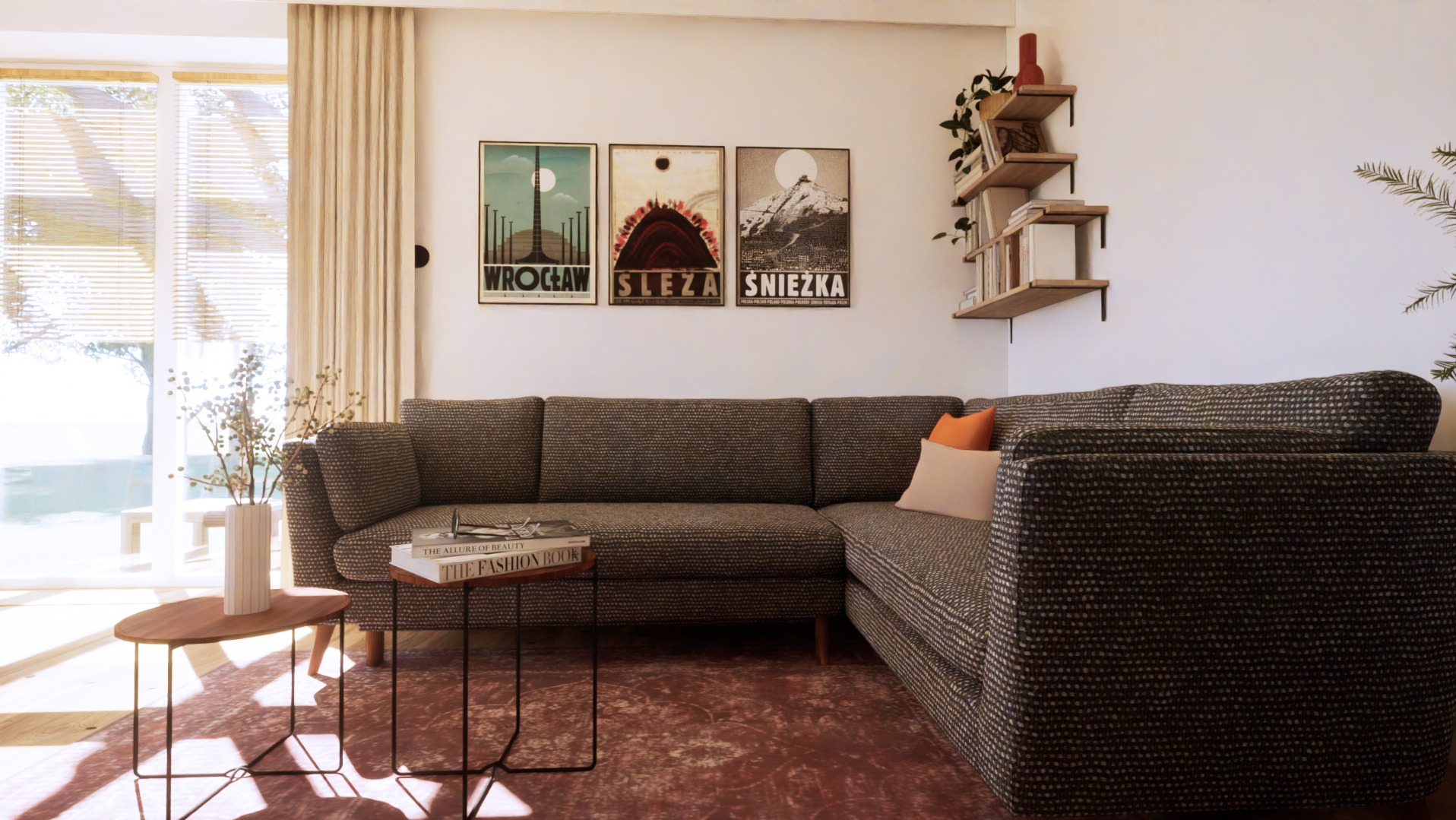 Jasny salon z narożną sofą w brązowo-szarym odcieniu, plakatami Wrocławia, Ślęży i Śnieżki na ścianie, oraz drewnianymi półkami z książkami.