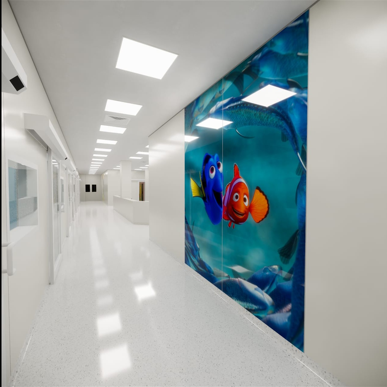 Korytarz w placówce medycznej z dekoracyjną folią na ścianie przedstawiającą postacie z filmu animowanego 'Gdzie jest Nemo'.