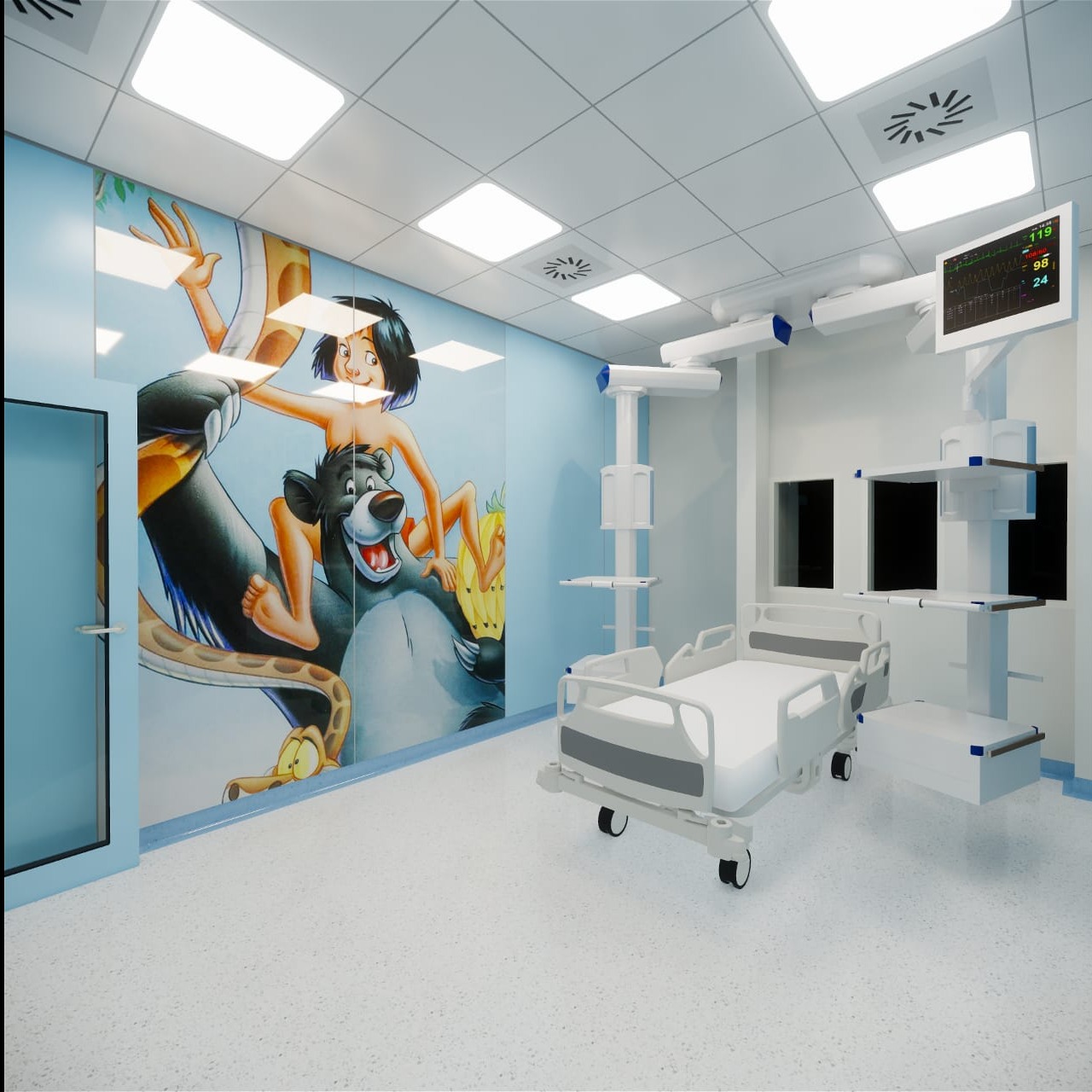 Wnętrze pokoju szpitalnego z muralem z motywami bajkowymi na ścianie, białe łóżko szpitalne na kółkach, aparatura medyczna i monitor parametrów życiowych.
