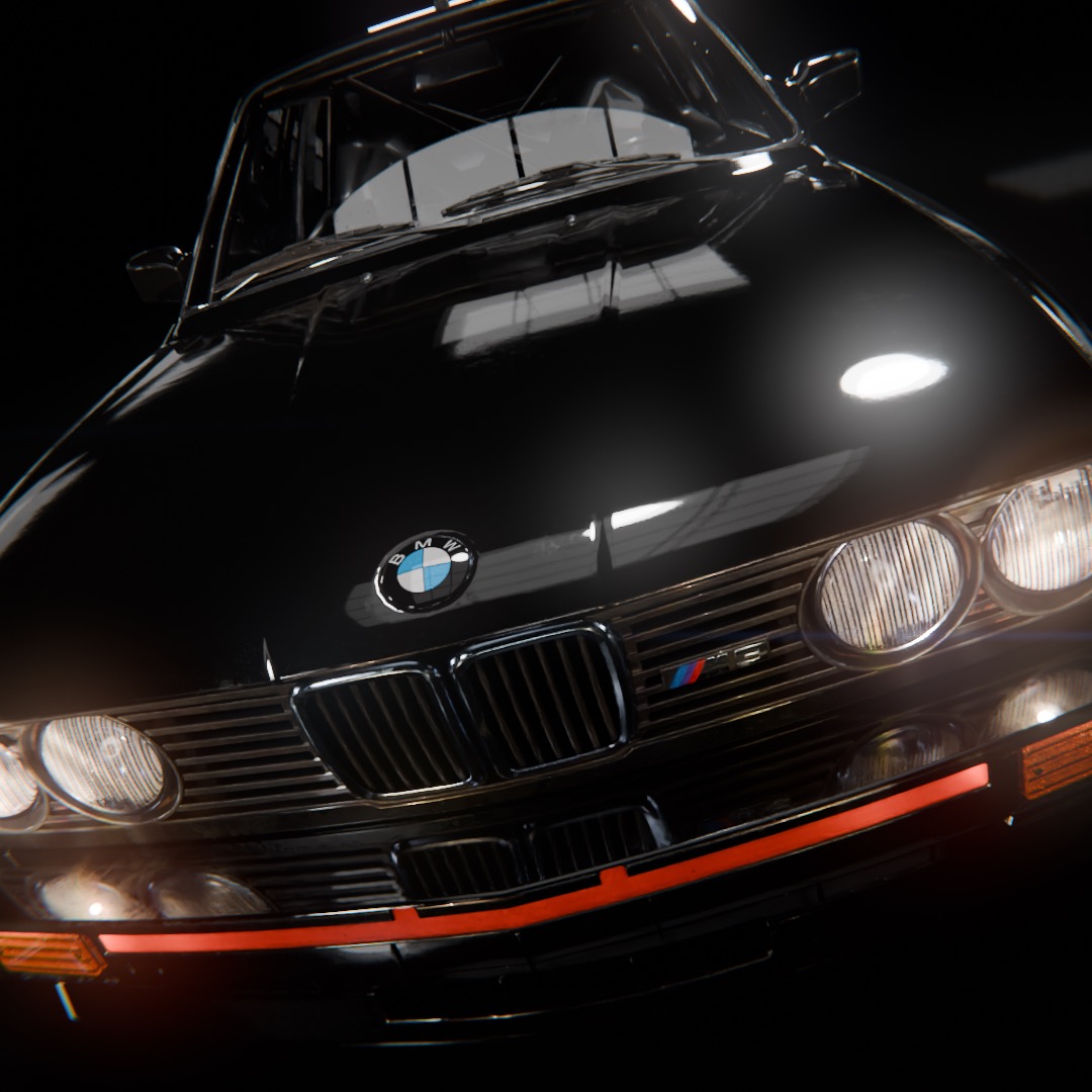 Czarny samochód BMW E30 M3 w ujęciu od dołu, z widocznymi reflektorami, grillem i logo marki.