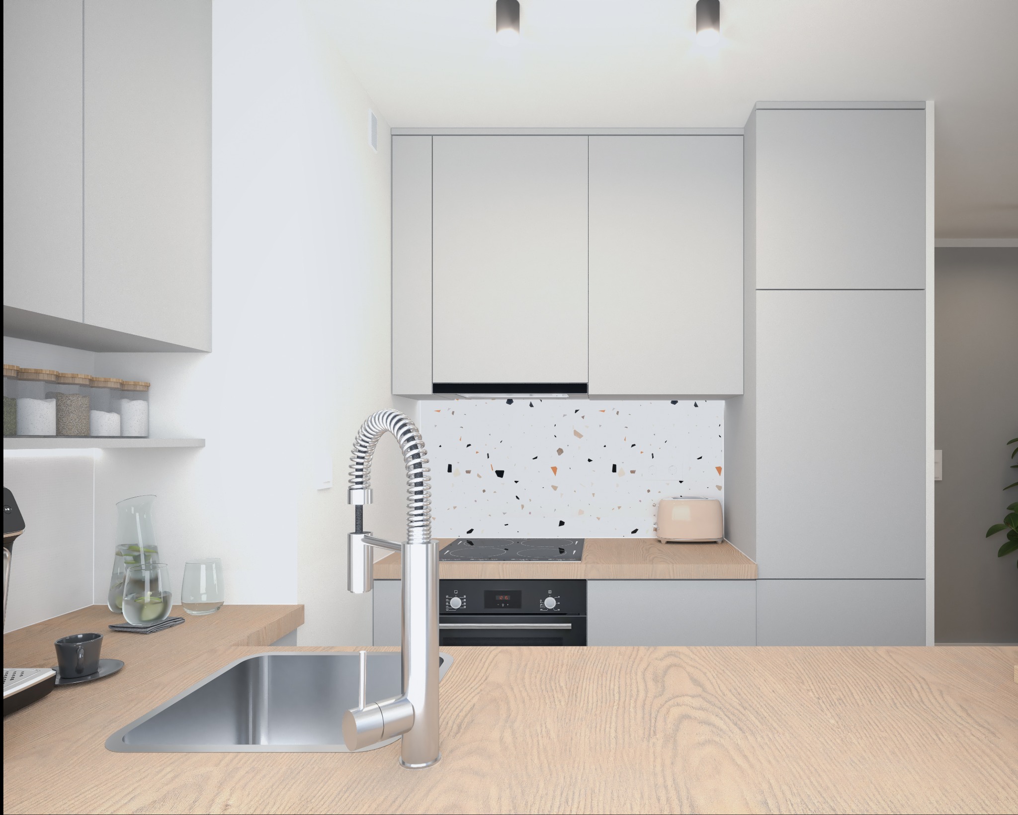 Minimalistyczna kuchnia w odcieniach szarości z drewnianym blatem, widoczny chromowany kran z elastyczną wylewką, płyta indukcyjna i piekarnik, oraz backsplash z motywem lastryko.