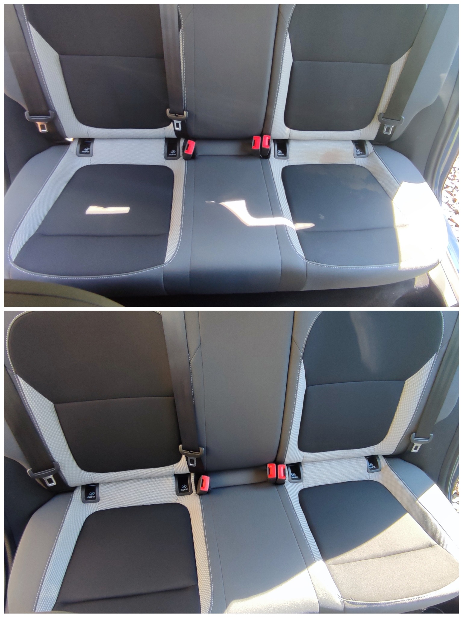 Wnętrze samochodu: tylna kanapa z czarno-szarą tapicerką, widoczne mocowania ISOFIX i pasy bezpieczeństwa, na jednym z siedzeń widoczny jaśniejszy ślad.