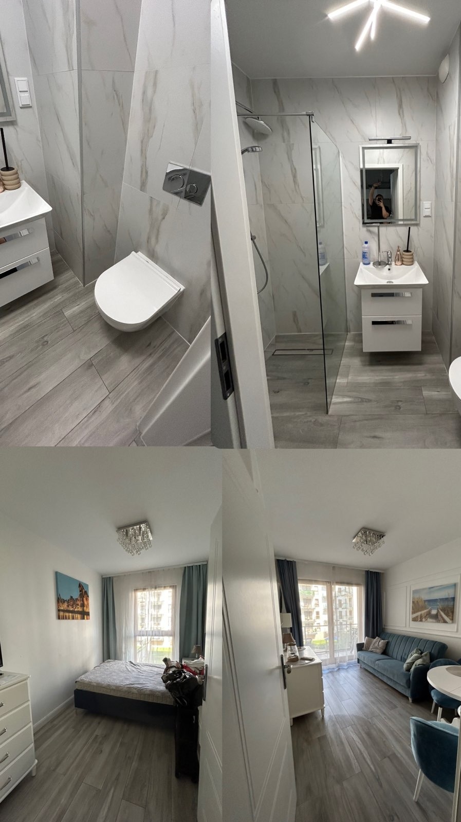 Wnętrze apartamentu: łazienka z kabiną prysznicową i toaletą, sypialnia z łóżkiem oraz salon z niebieską sofą, widok z perspektywy otwartych drzwi.