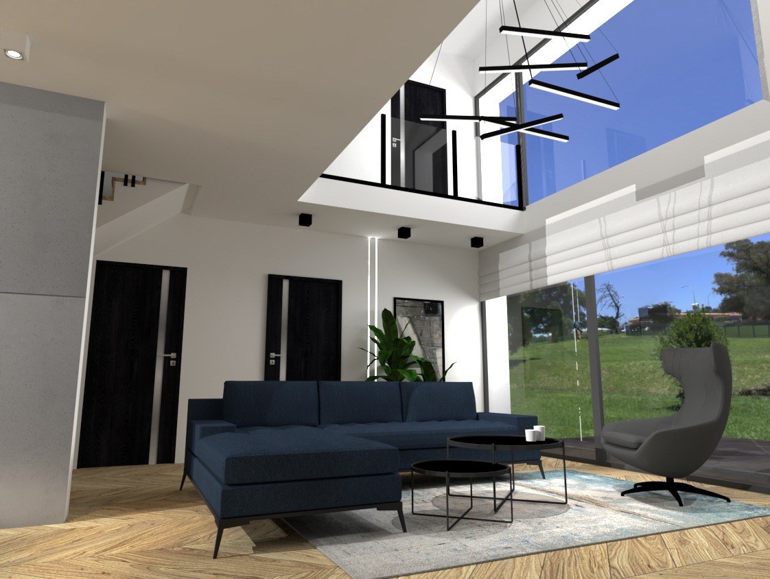 Nowoczesny salon z granatową sofą modułową, okrągłymi stolikami kawowymi i designerskim krzesłem na tle panoramicznego okna z widokiem na zieleń.