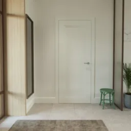 Nowoczesny przedpokój z drewnianą szafą z ryflowanymi panelami, lustrem w ciemnej ramie, białymi drzwiami i zielonym stołkiem obok rośliny doniczkowej, z widokiem na jasną kuchnię w tle.