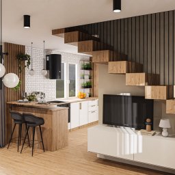 Och.Design - Nowoczesne wnętrze domu w Bad Grönenbach: otwarta kuchnia z wyspą, schody z drewnianych bloków z czarnymi barierkami, białe meble i podłoga z paneli, widok na salon z telewizorem.