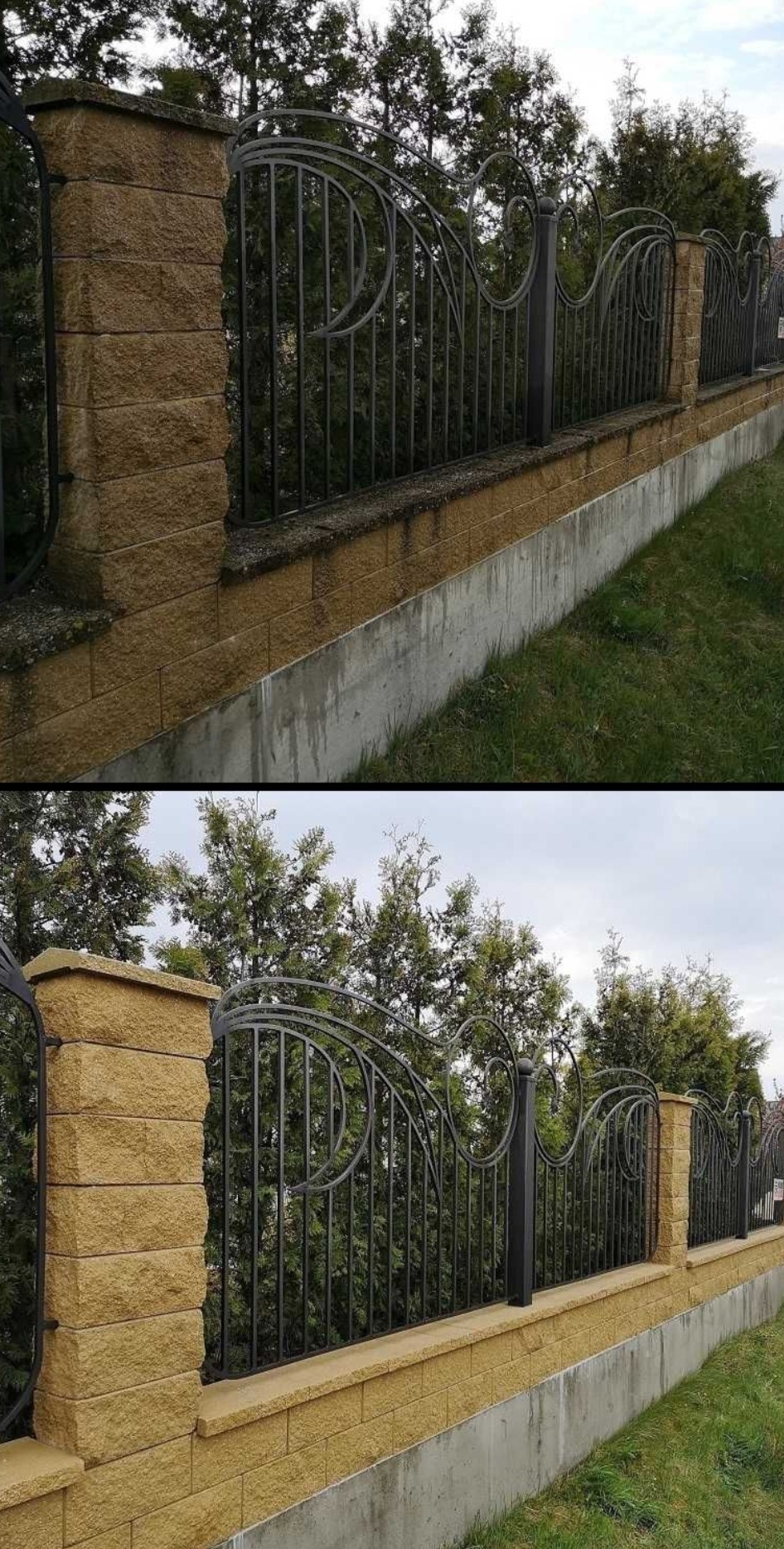 Kamienny murek z metalowym, ozdobnym ogrodzeniem na tle zielonych drzew, widoczne ślady wilgoci na betonowej podstawie murku.