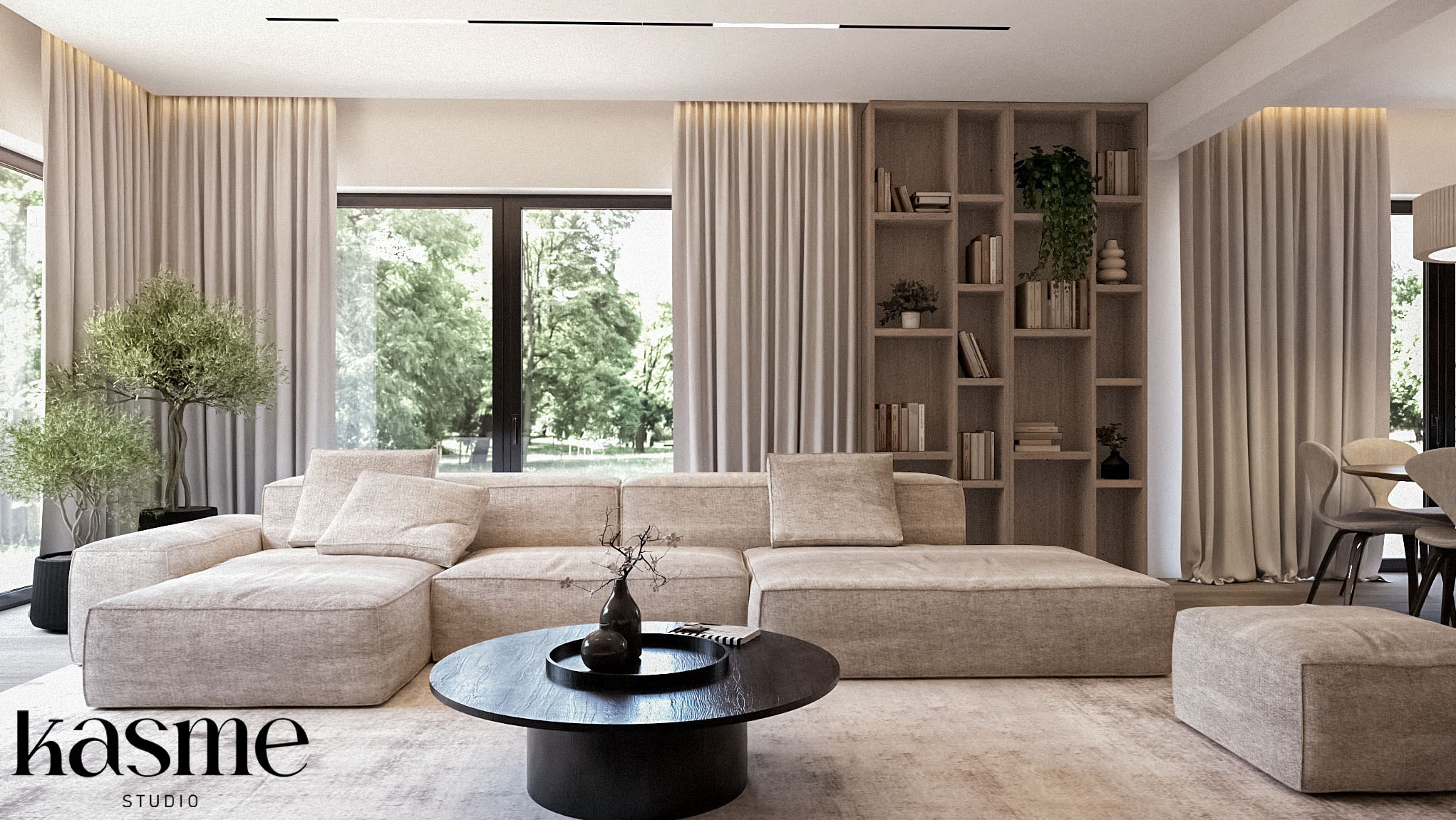 Jasny salon z modułową sofą, okrągłym stolikiem kawowym z czarnym blatem i otwartym regałem z książkami, oświetlony naturalnym światłem wpadającym przez duże okna.