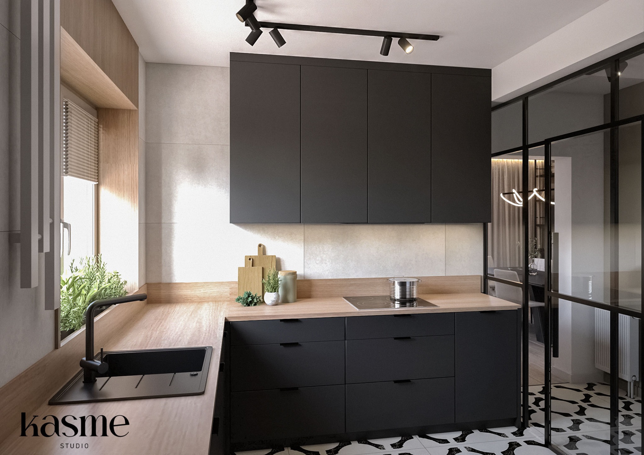 Nowoczesna kuchnia z czarnymi szafkami, drewnianym blatem i wzorzystą podłogą, oświetlona reflektorami punktowymi, z widokiem na salon przez przeszkloną ścianę.