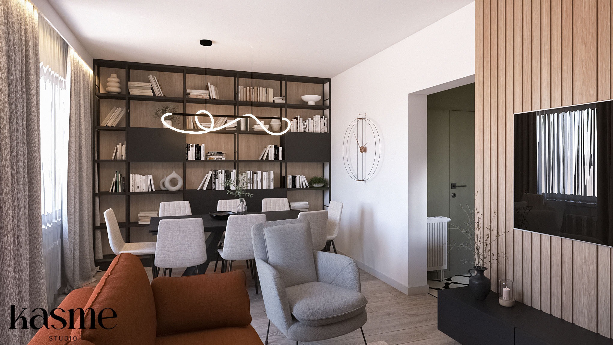 Nowoczesna aranżacja salonu z jadalnią w Białymstoku, z dużą biblioteczką, stołem z krzesłami, szarym fotelem i elementami dekoracyjnymi, oświetlona ledową lampą wiszącą.
