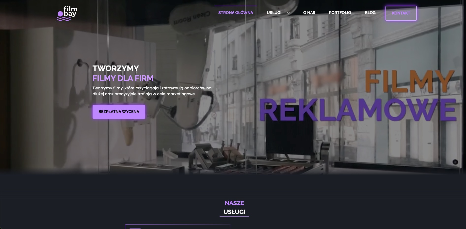 Strona internetowa firmy filmbay.pl prezentująca ofertę tworzenia filmów reklamowych dla firm, z widocznym fragmentem studia filmowego i hasłem 'Tworzymy filmy dla firm'.