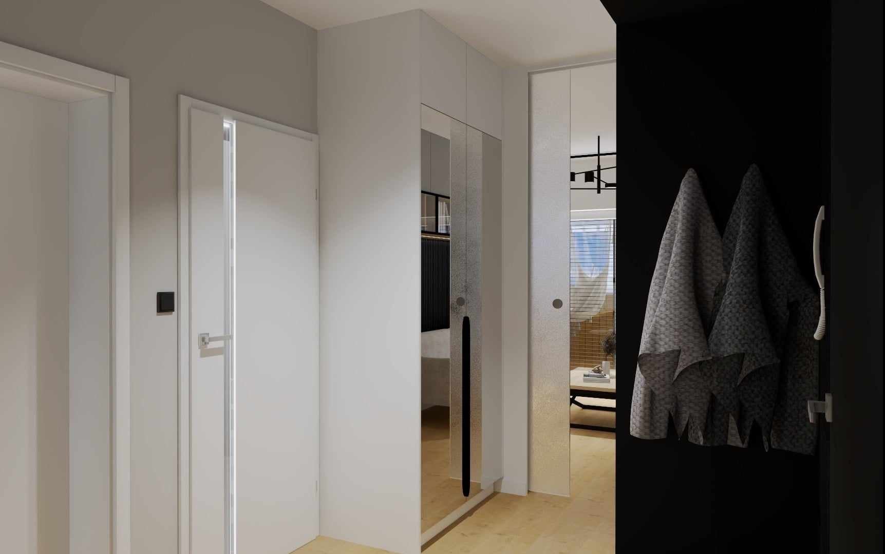 Nowoczesny przedpokój z białymi drzwiami, szafą z lustrzanym frontem i czarną ścianą z szarymi ręcznikami.