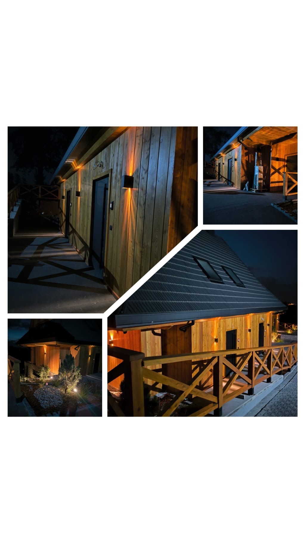 Drewniany budynek oświetlony zewnętrznymi lampami ściennymi, widoczne detale architektury i oświetlenia nocnego.