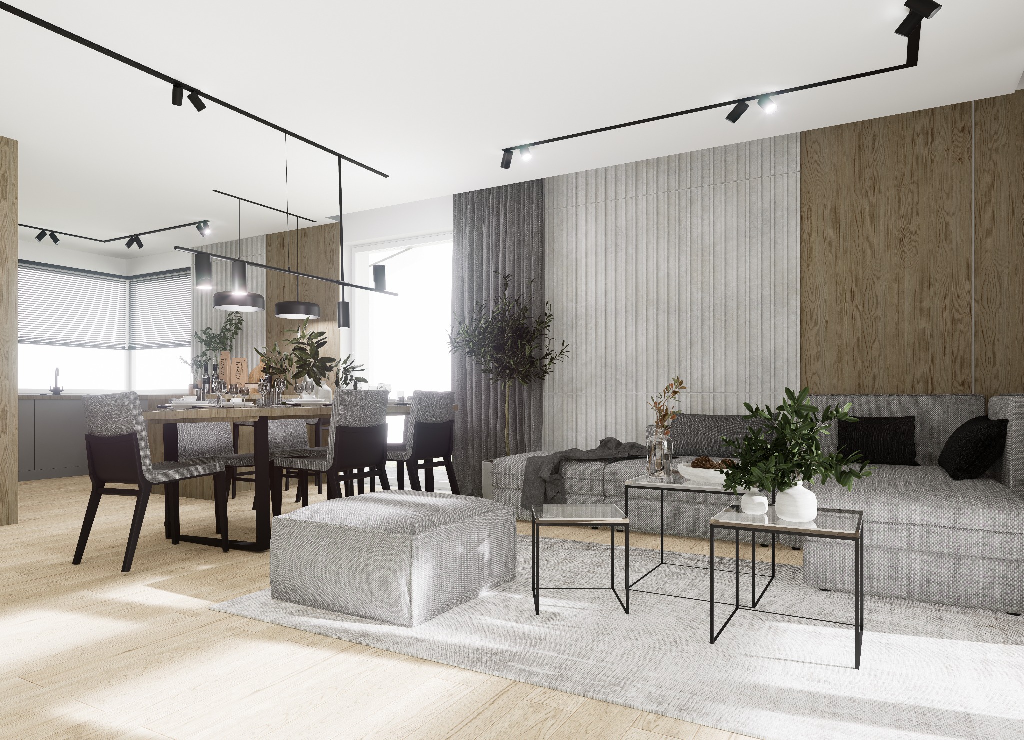 Nowoczesne wnętrze: salon z jadalnią, szary narożnik, drewniany stół i parkiet, oświetlenie szynowe.