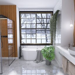 Art Tabor Design Marta Tabor - Nowoczesna łazienka z kabiną prysznicową typu walk-in, wolnostojącą wanną pod oknem z widokiem na zimowy krajobraz, oraz umywalką nablatową na blacie z drewnianym panelem dekoracyjnym i okrągłym...