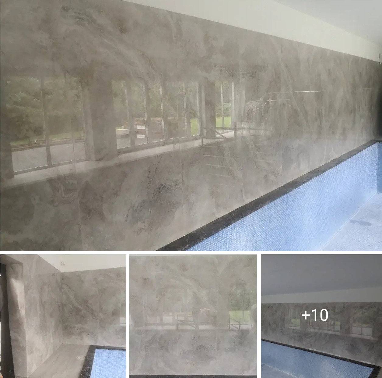 Polerowane, szare płytki imitujące marmur na ścianie z oknem i mozaika basenowa, wykończone czarnym pasem. Gładka powierzchnia odbija światło.