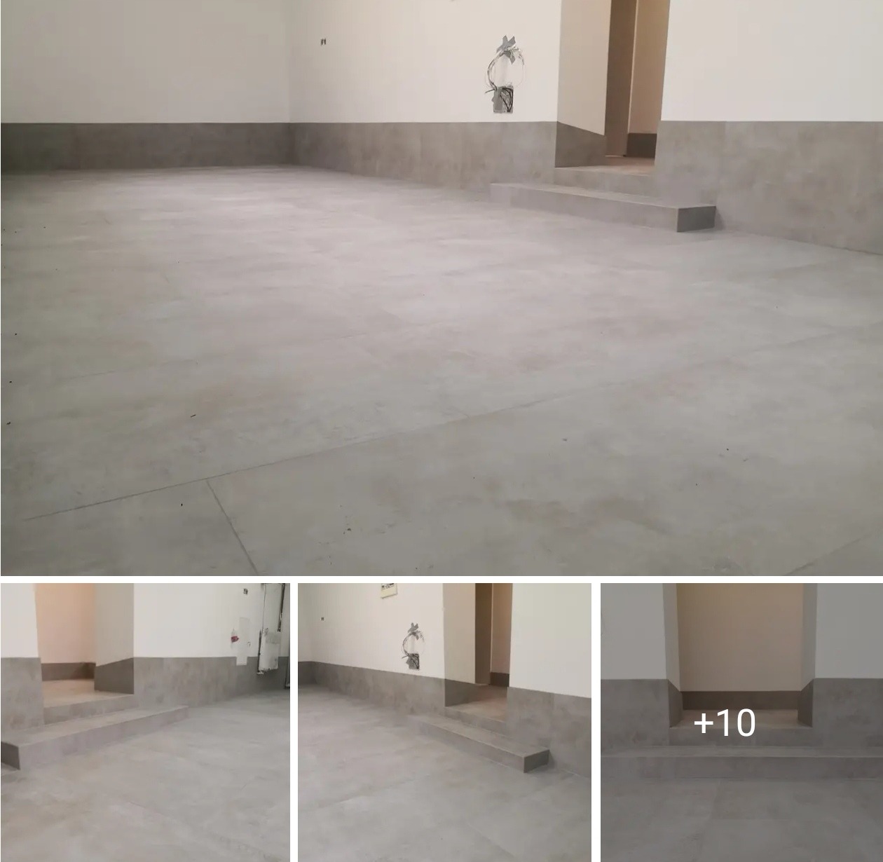 Wykończone podłogi w szarych płytkach, z widocznym stopniem i fragmentem ściany z instalacją elektryczną. Minimalistyczny design, neutralna kolorystyka.