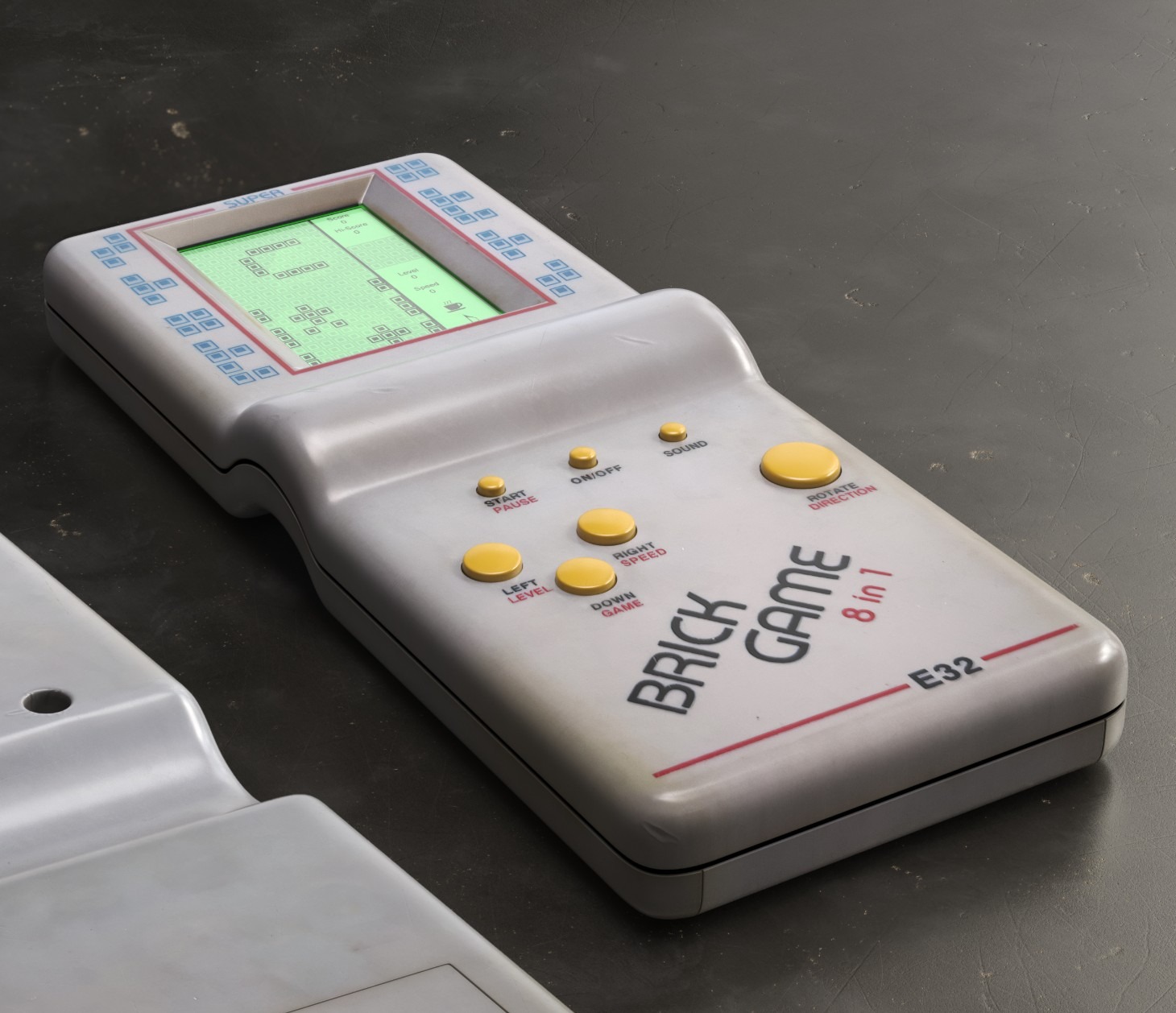 Retro przenośna konsola Brick Game 8 in 1 z wyświetlaczem pokazującym grę w Tetris, leżąca na szarym tle.