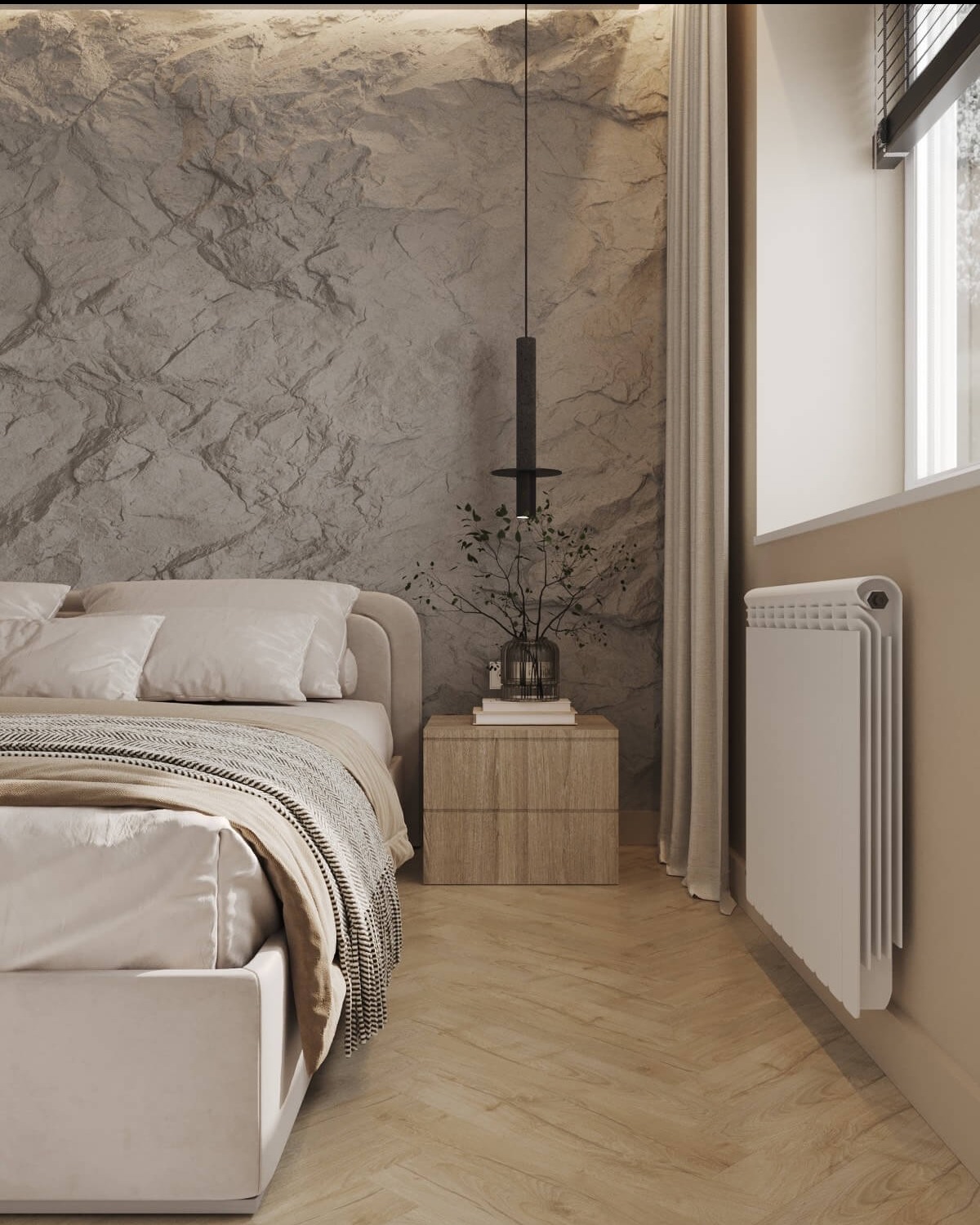 Sypialnia z łóżkiem w beżowej tapicerce, kamienną ścianą, wiszącą lampą nad szafką nocną i grzejnikiem pod oknem, parkiet w jodełkę.