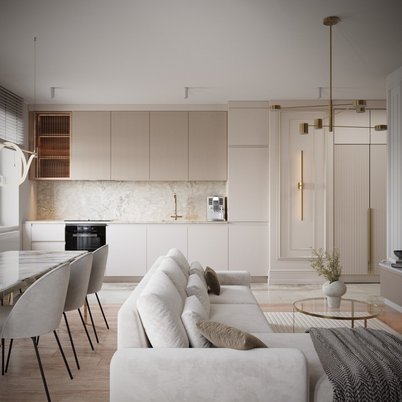 Eleganckie wnętrze: beżowa kuchnia z marmurowym blatem, sofa w odcieniach bieli, złoty żyrandol i detale. Minimalistyczny design z akcentami luksusu.
