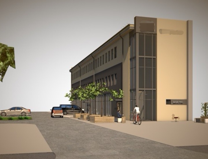 Wizualizacja budynku handlowo-usługowego z elementami architektury miejskiej: drzewa w donicach, rowerzysta, miejsca siedzące. Budynek z dużymi oknami i elewacją w odcieniach beżu i szarości.