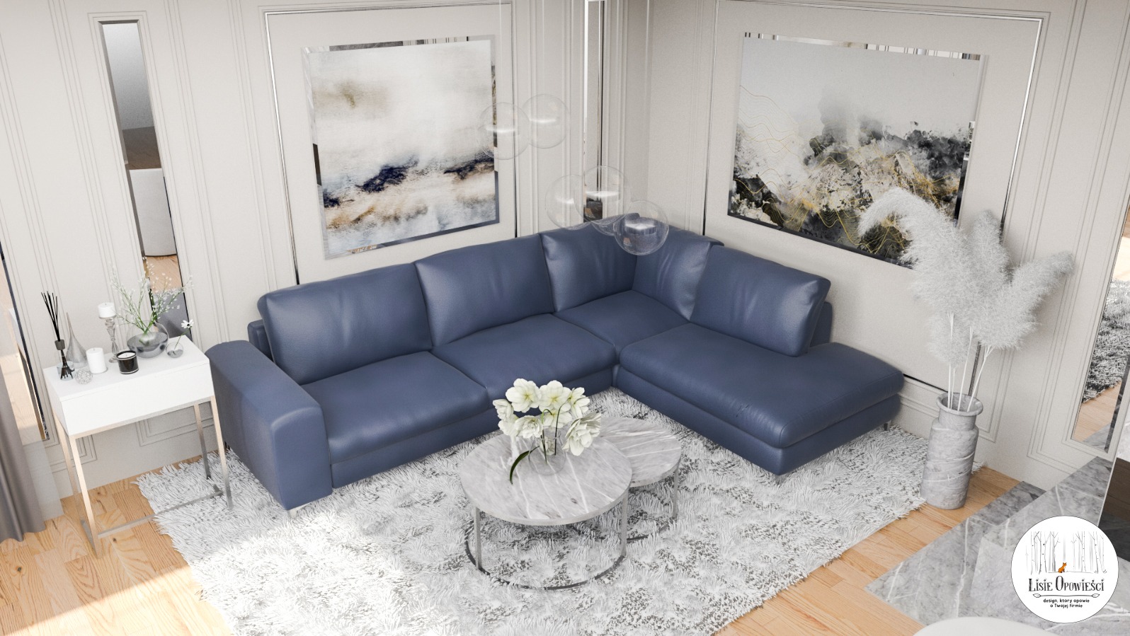 Wizualizacja wnętrza salonu z narożną, niebieską sofą, marmurowymi stolikami kawowymi i puszystym dywanem, uzupełniona o dekoracje ścienne i kwiaty w wazonie.