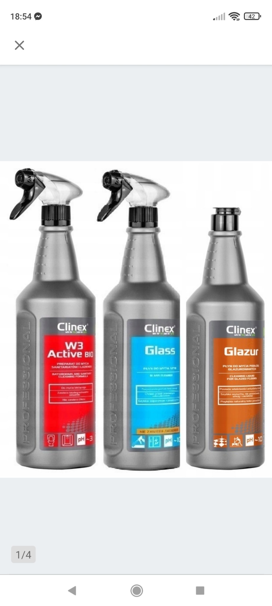 Trzy szare butelki z rozpylaczami marki Clinex Professional: W3 Active BIO do łazienek, Glass do szyb i Glazur do podłóg glazurowanych, ustawione obok siebie na białym tle.