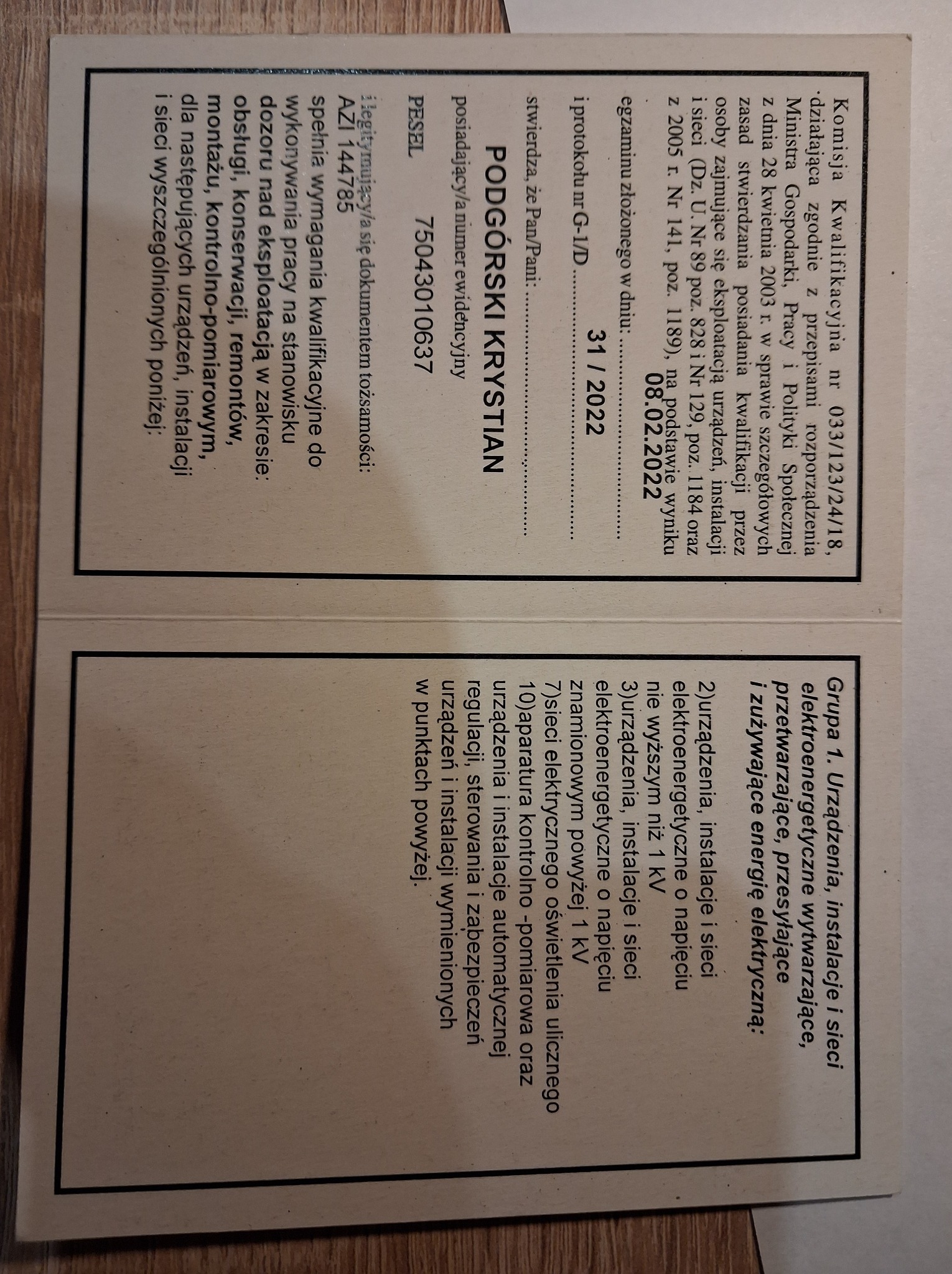 Skan dokumentu potwierdzającego kwalifikacje elektryczne, wydanego przez Komisję Kwalifikacyjną, z datą egzaminu 08.02.2022 i numerem protokołu G-1/D, potwierdzający uprawnienia do eksploatacji...