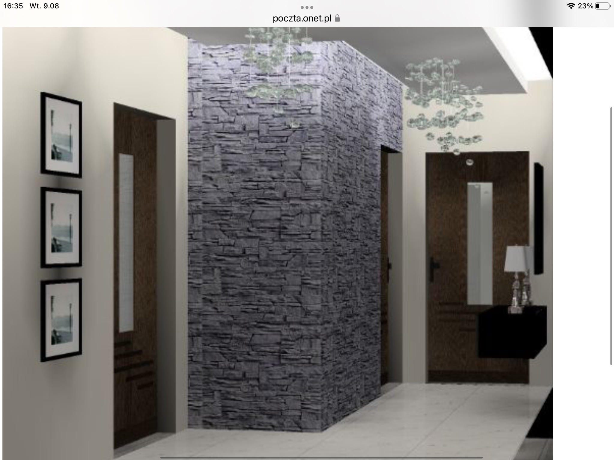 Aranżacja przedpokoju z kamienną ścianą, drewnianymi drzwiami i nowoczesnym oświetleniem.