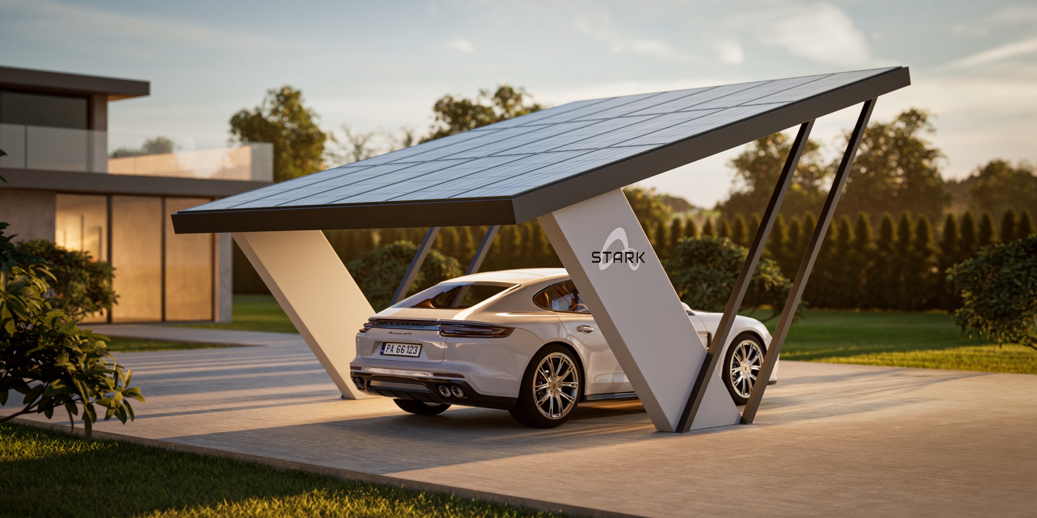 Nowoczesna wiata garażowa z panelami słonecznymi, pod którą zaparkowany jest biały samochód marki Porsche, na tle zadbanego ogrodu.