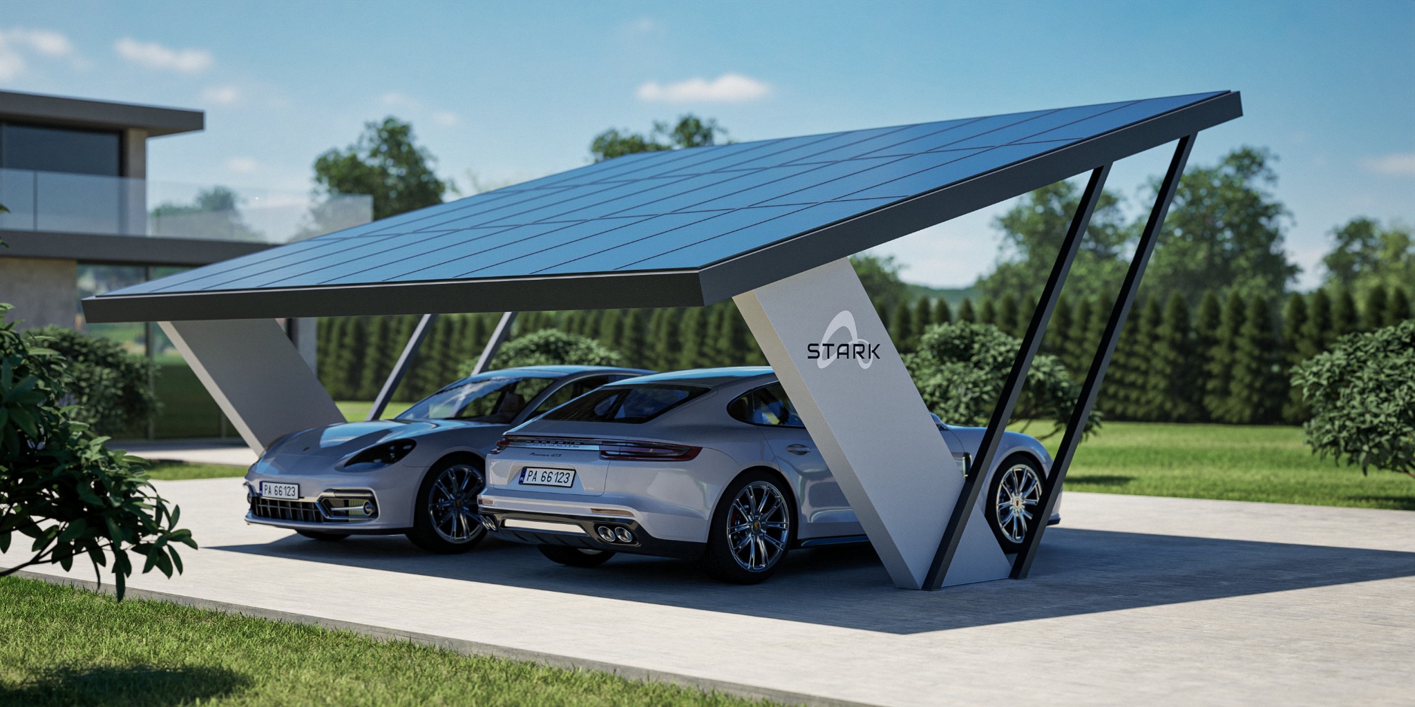 Dwa samochody Porsche zaparkowane pod nowoczesną wiatą solarną z logo STARK na tle domu i zieleni.