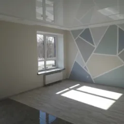 Jasne, przestronne wnętrze pokoju po odświeżeniu, z geometrycznym wzorem na ścianie w odcieniach szarości i błękitu, panelami podłogowymi imitującymi drewno oraz lśniącym, podwieszanym sufitem...