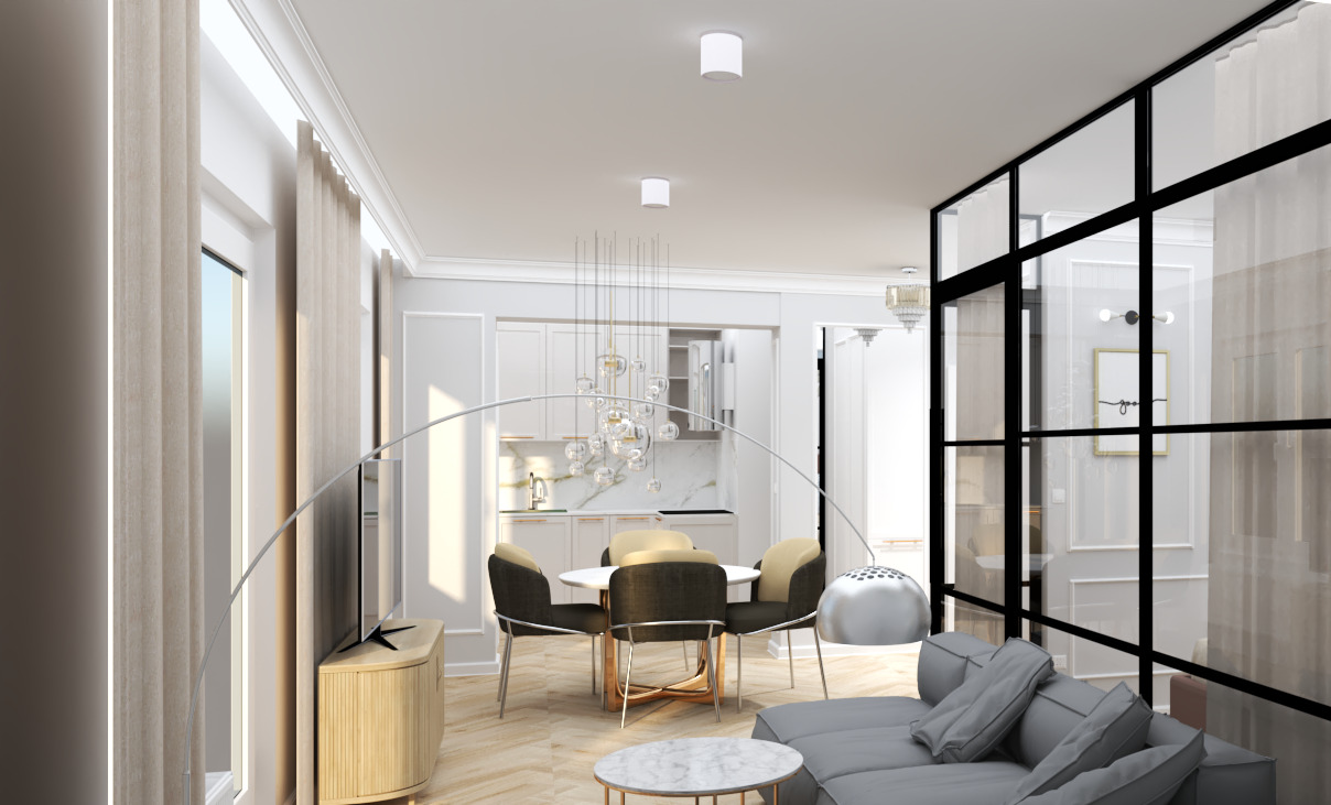 Jasne wnętrze mieszkania z otwartą kuchnią, okrągłym stołem jadalnym z krzesłami i szarą sofą, oddzielone szklaną ścianą z czarnymi ramami.