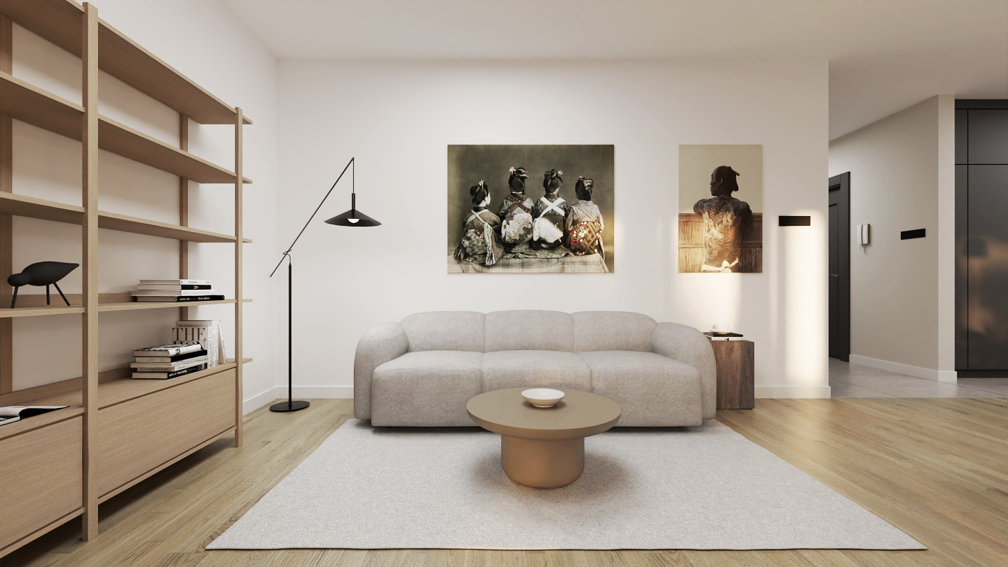 Jasne wnętrze salonu z drewnianą podłogą, kremową sofą, okrągłym stolikiem kawowym i regałem na książki, ozdobione obrazami na ścianie w stylu azjatyckim i nowoczesną lampą.