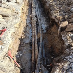 Usługi Minikoparka Strzelin - Odkrywanie przyłączy wodnych wraz z wyjęciem tuneli/łupiny