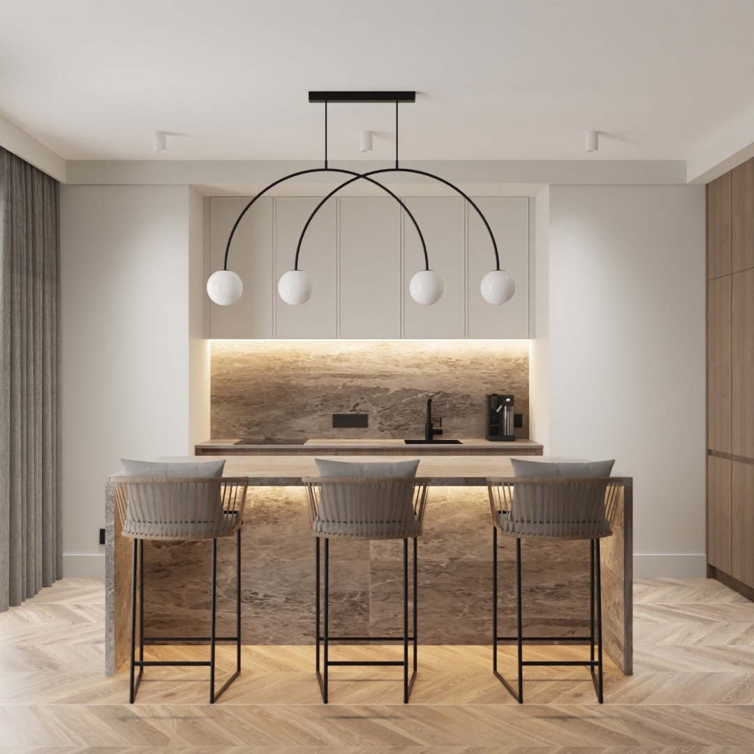 Nowoczesna kuchnia z wyspą wykończoną marmurkowym kamieniem, oświetlona wiszącą lampą z kulistymi kloszami i podświetleniem LED pod szafkami, uzupełniona drewnianymi szafkami i parkietem w jodełkę.