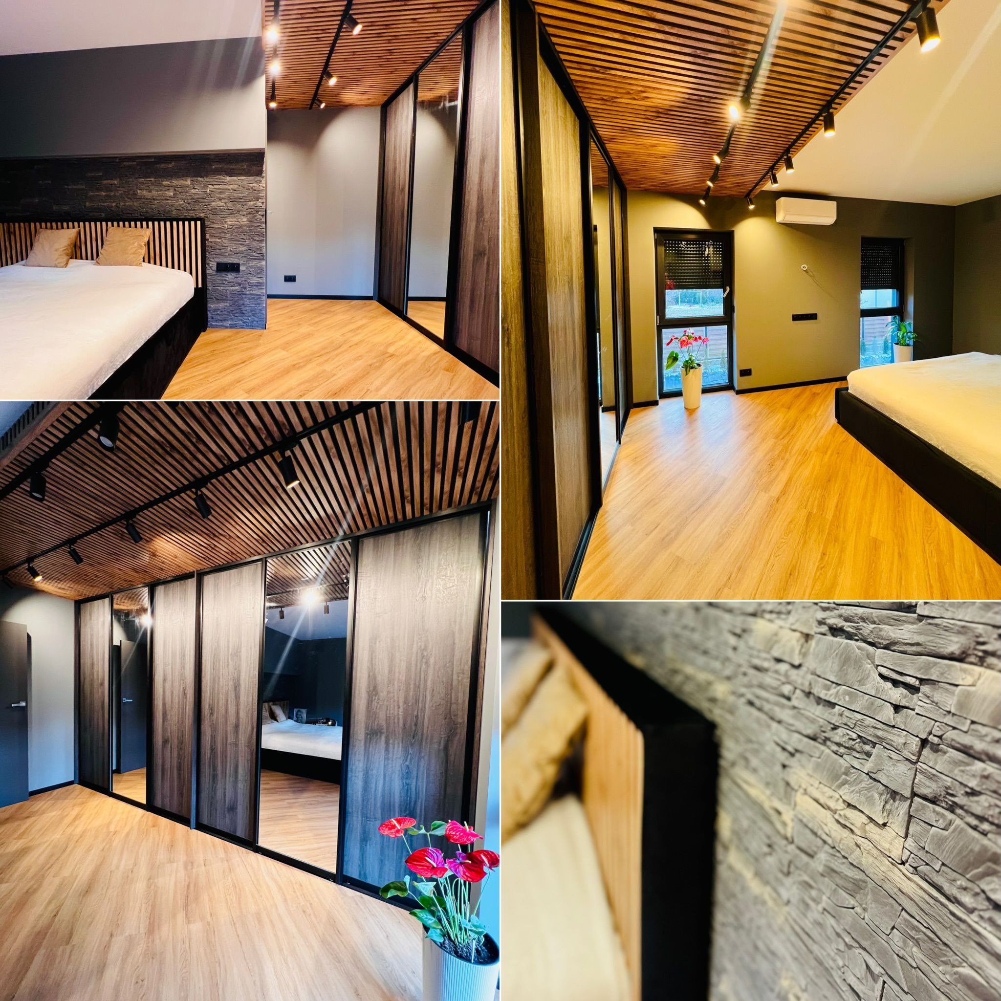 Nowoczesna sypialnia po remoncie: drewniany sufit lamelowy z oświetleniem, kamienna ściana za łóżkiem, podłoga z paneli i szafa z lustrzanymi drzwiami przesuwnymi.