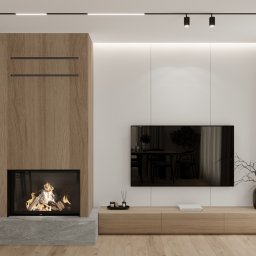 Yurii Fedenko Solutions - Minimalistyczny salon z drewnianym kominkiem, czarnym wnęką na drewno i telewizorem zawieszonym na białej ścianie, oświetlenie szynowe na suficie, drewniana podłoga.