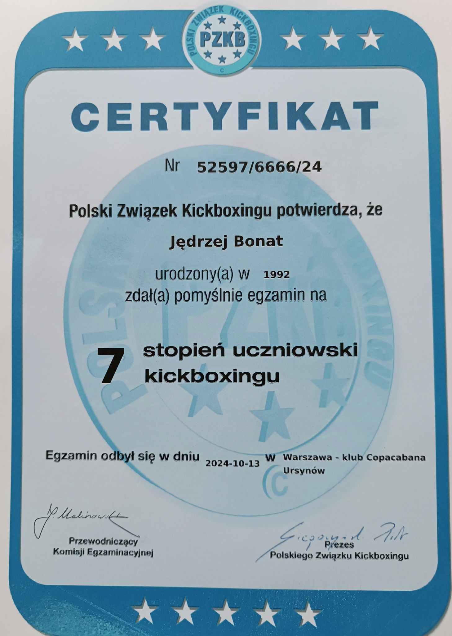 Certyfikat Polskiego Związku Kickboxingu dla Jędrzeja Bonata, potwierdzający zdanie egzaminu na 7 stopień uczniowski kickboxingu w klubie Copacabana, Warszawa, 2024-10-13.