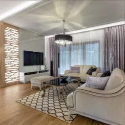 elegancki salon z drewnianą podłogą i meblami firmy Kler