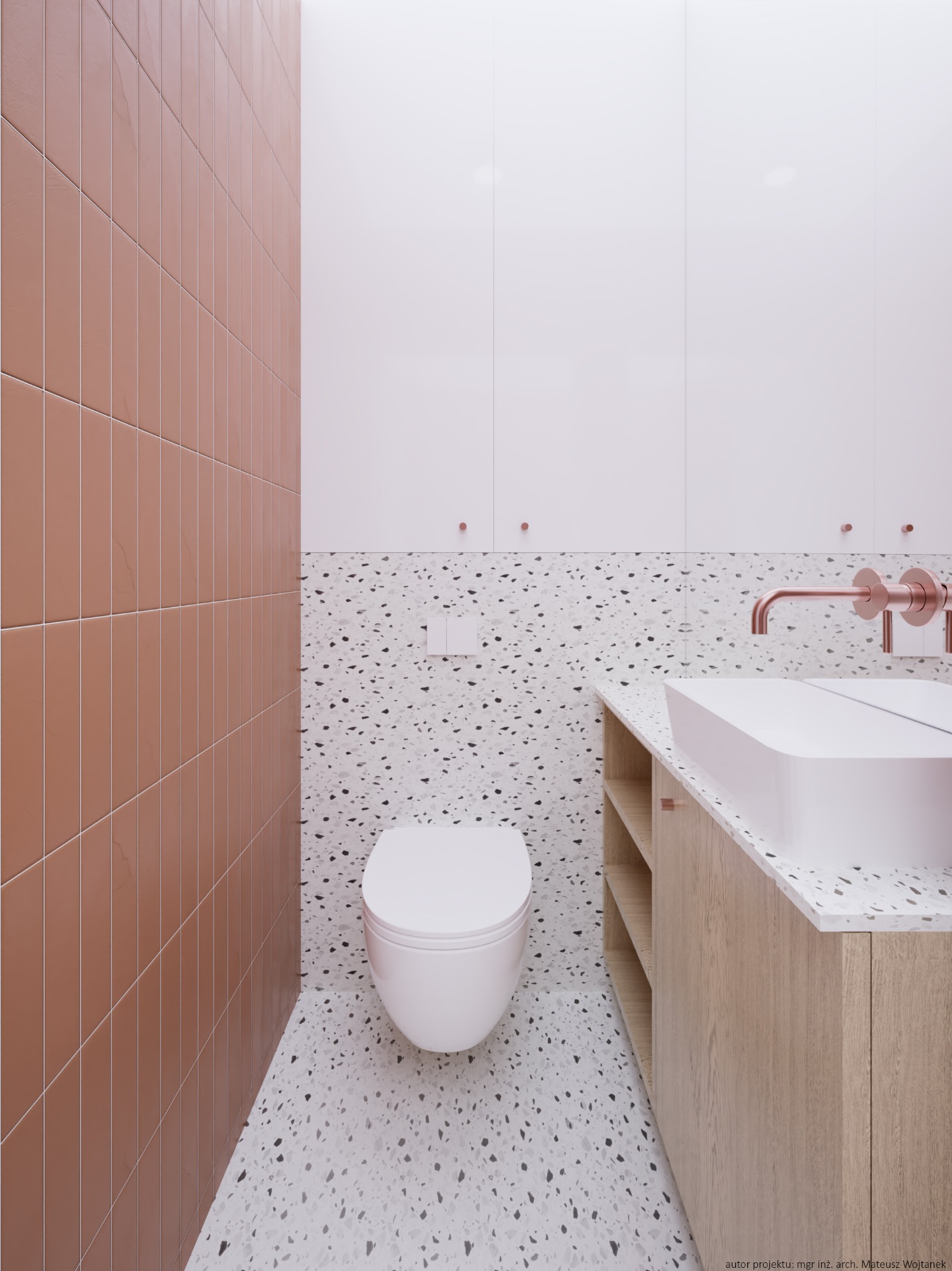 Nowoczesna łazienka z brązowymi płytkami na ścianie, podłogą i ścianą w mozaikę lastryko, białą umywalką i toaletą oraz armaturą w kolorze różowego złota.