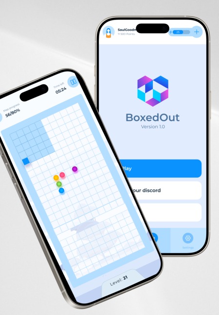 Dwa smartfony prezentują interfejs gry mobilnej 'BoxedOut' z kolorowymi kulkami i siatką. Jeden pokazuje ekran gry, drugi menu główne z logo i przyciskiem 'Play'.