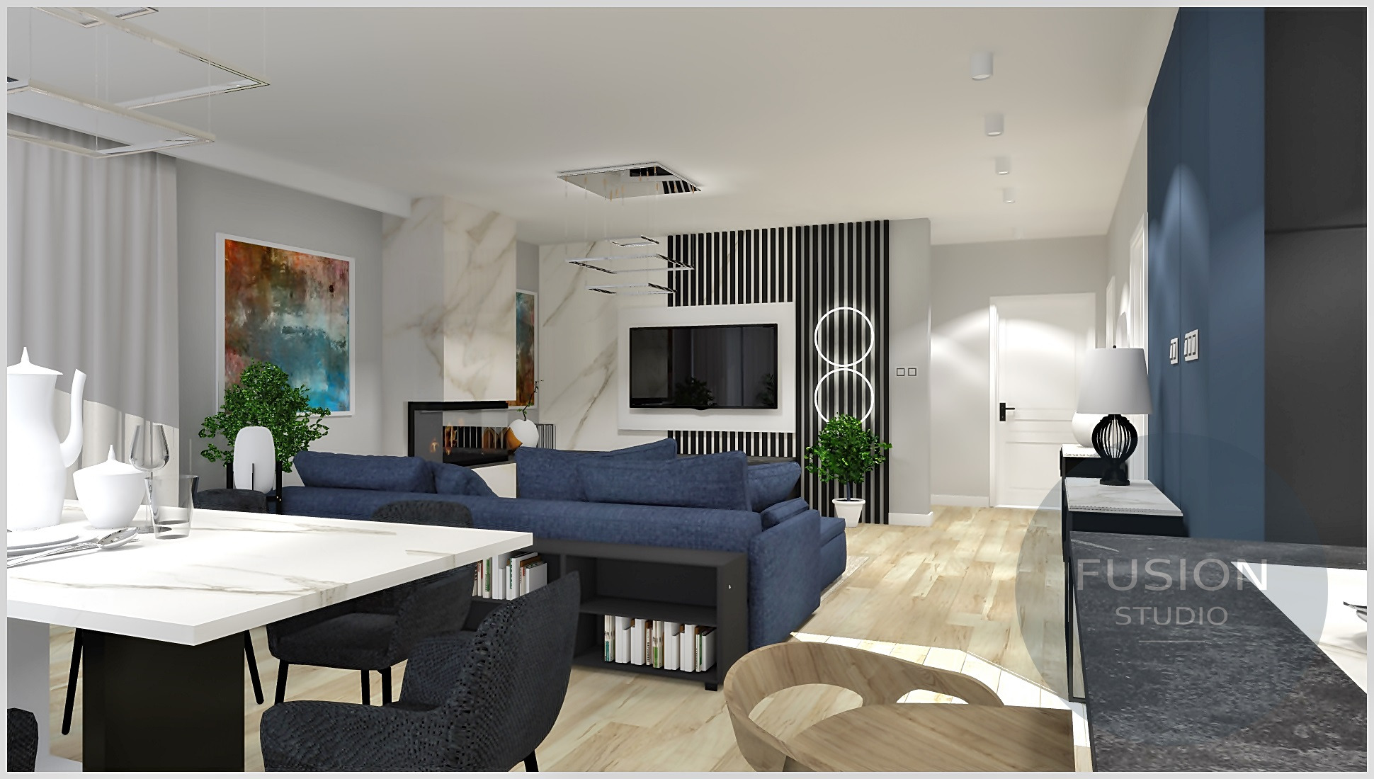 Salon z aneksem kuchennym: Niebieska sofa, biały stół z zastawą, czarne krzesła i dekoracje w nowoczesnym stylu, w tle ściana z pionowymi czarnymi paskami i telewizorem.