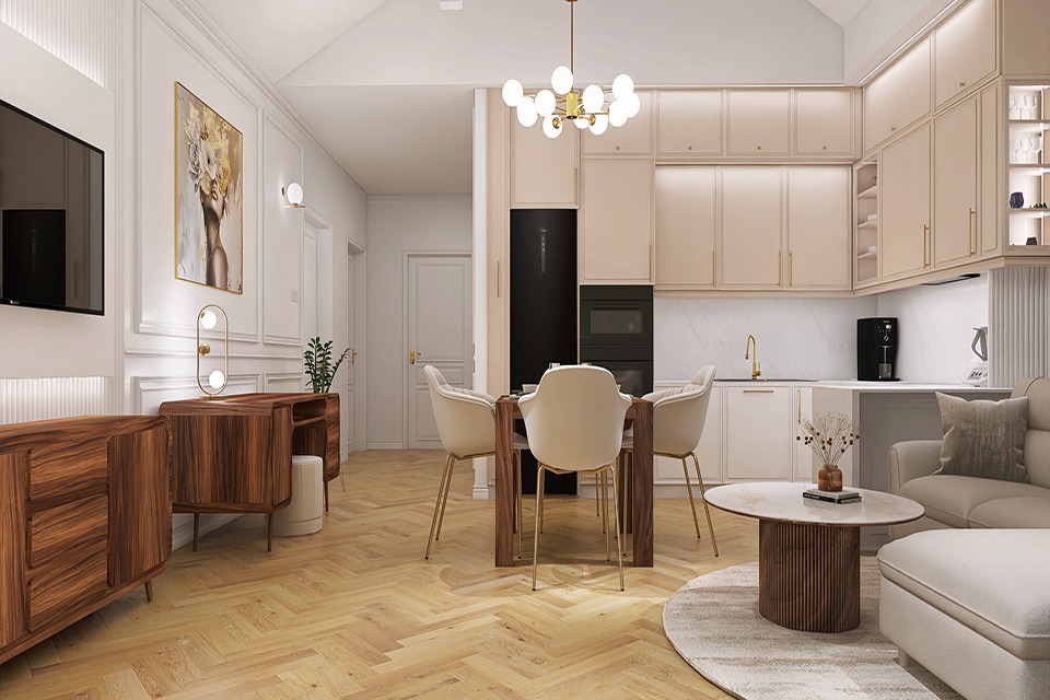 Jasne, przestronne wnętrze z parkietem w jodełkę, beżową zabudową kuchenną, drewnianym stołem jadalnianym i elementami dekoracyjnymi w stylu modern classic.