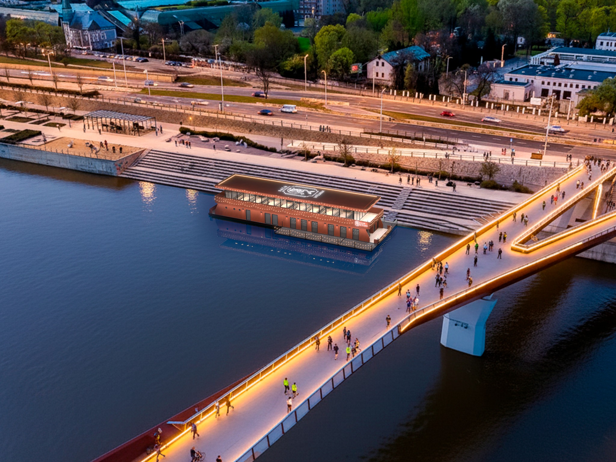 Wieczorny widok z góry na oświetlony most dla pieszych i pływający budynek na rzece, z ludźmi spacerującymi po moście i schodach.