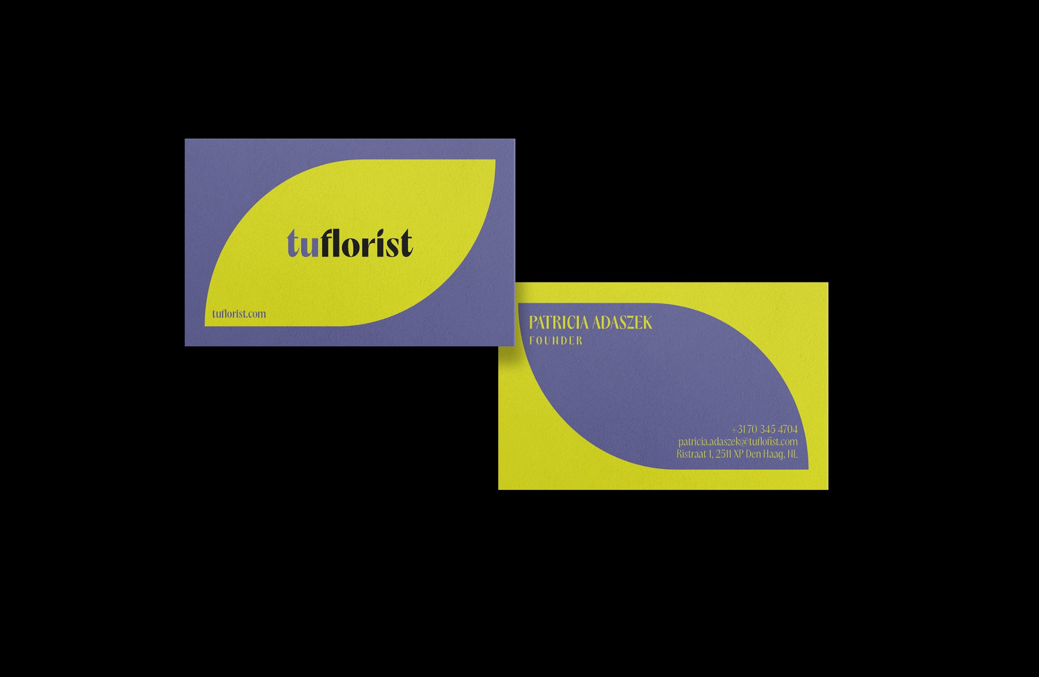 Dwie wizytówki w odcieniach fioletu i limonki, z logo 'tuflorist', danymi kontaktowymi i adresem firmy Patricia Adaszek.